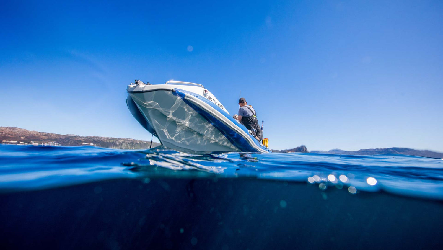 Dive Team boat wait for scuba divers
