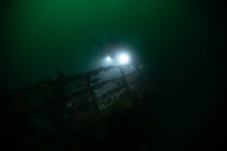 Torches illuminate a wreck at night in cape town