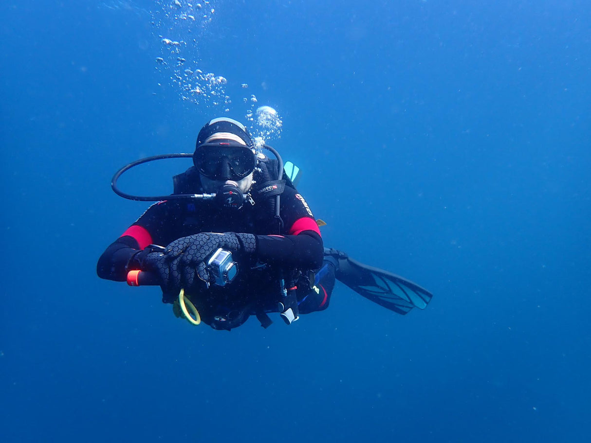 Nitrox diver hanging on a safety stop after a deep dive