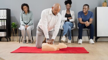 Practicing CPR on the Emergency first responders course